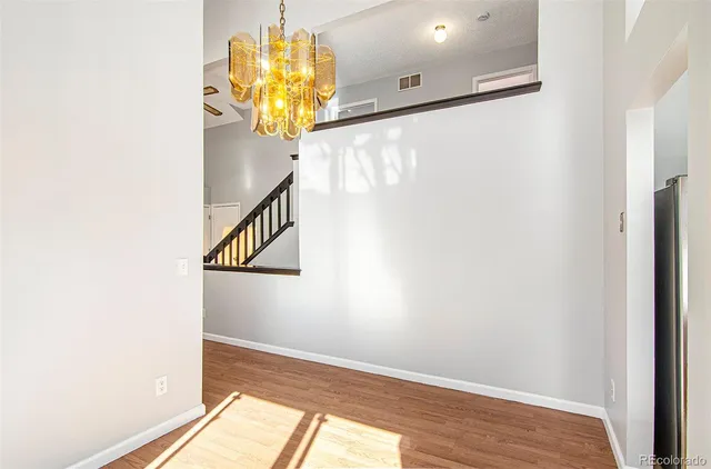 a view of a living room with a large window