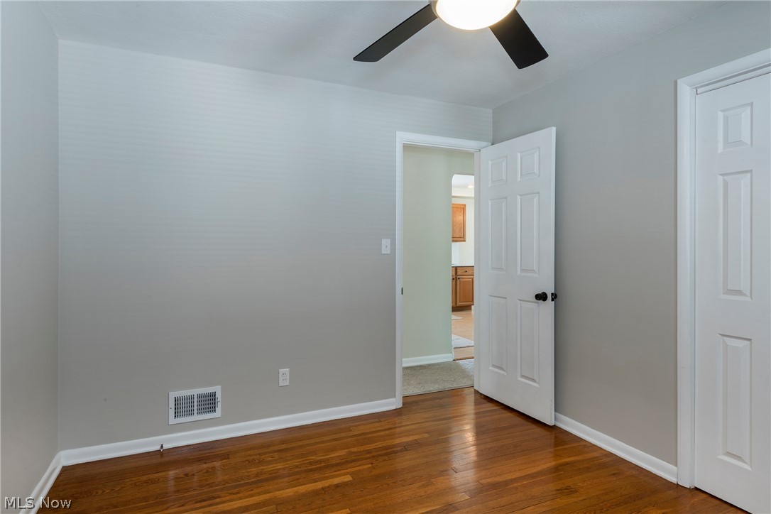 13175 McCracken Road Cleveland, OH 44125 - Photo 15 of 48 Bedroom with ceiling fan and hardwood / wood-style flooring