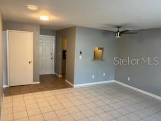1329 Drew Street, Unit 8 Clearwater, FL 33755 - Photo 2 of 19 a view of a livingroom with an empty space
