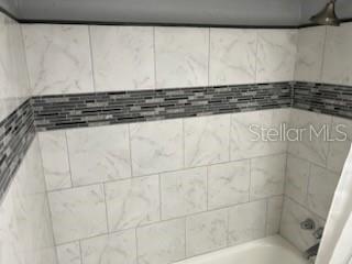 1329 Drew Street, Unit 8 Clearwater, FL 33755 - Photo 10 of 19 a bathroom with a shower