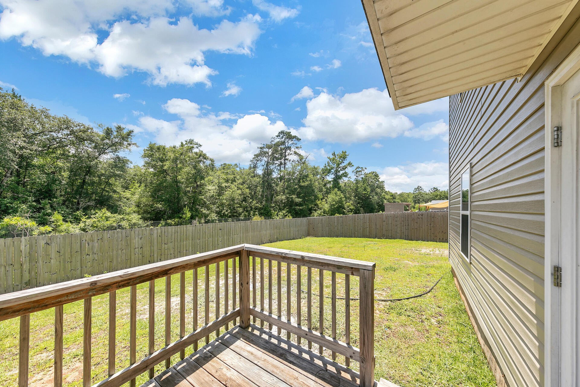 4624 Plover Drive Crestview, FL 32539 - Photo 17 of 34 a view of a balcony with lake view