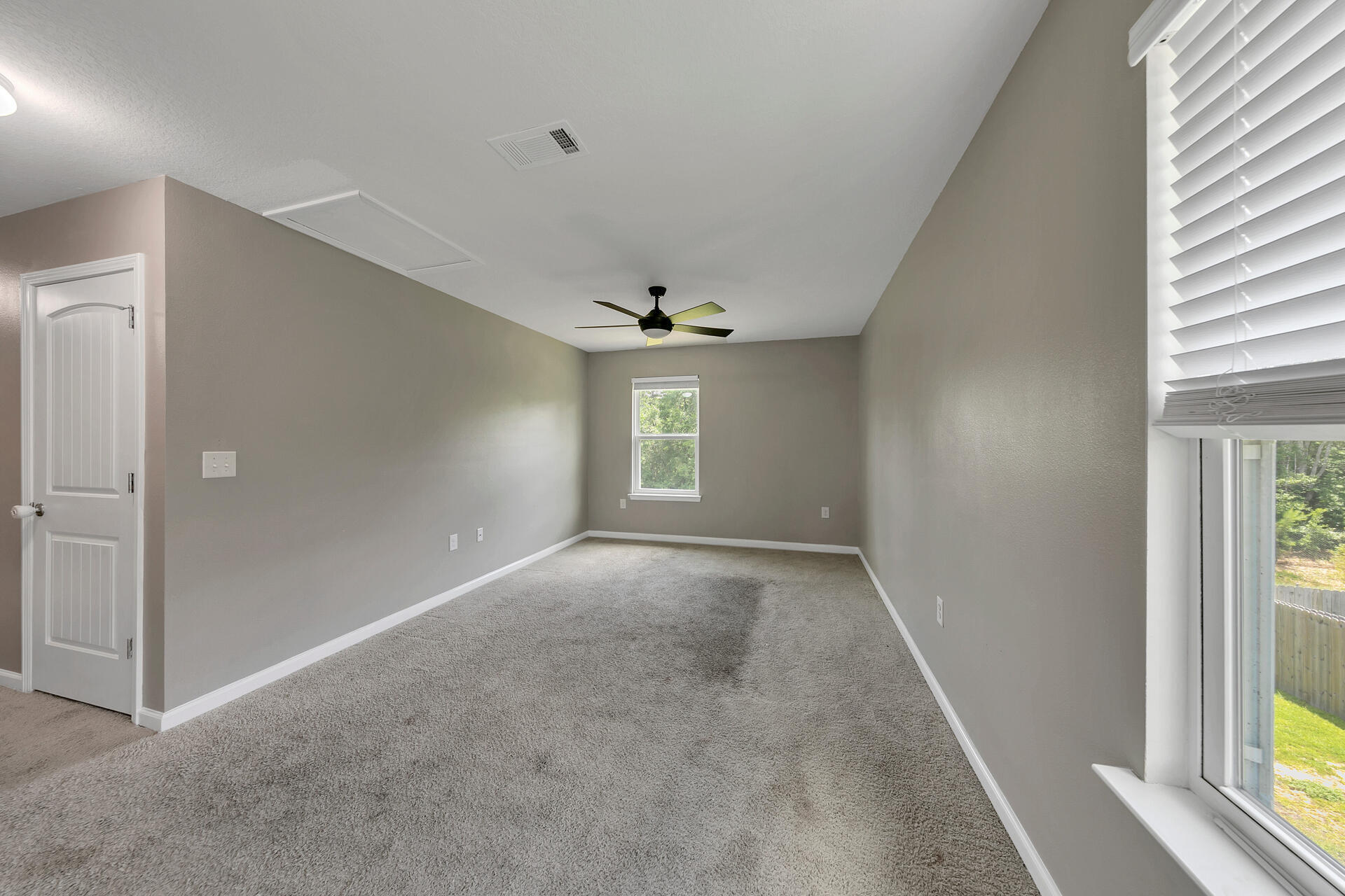 4624 Plover Drive Crestview, FL 32539 - Photo 24 of 34 a view of an empty room with a window