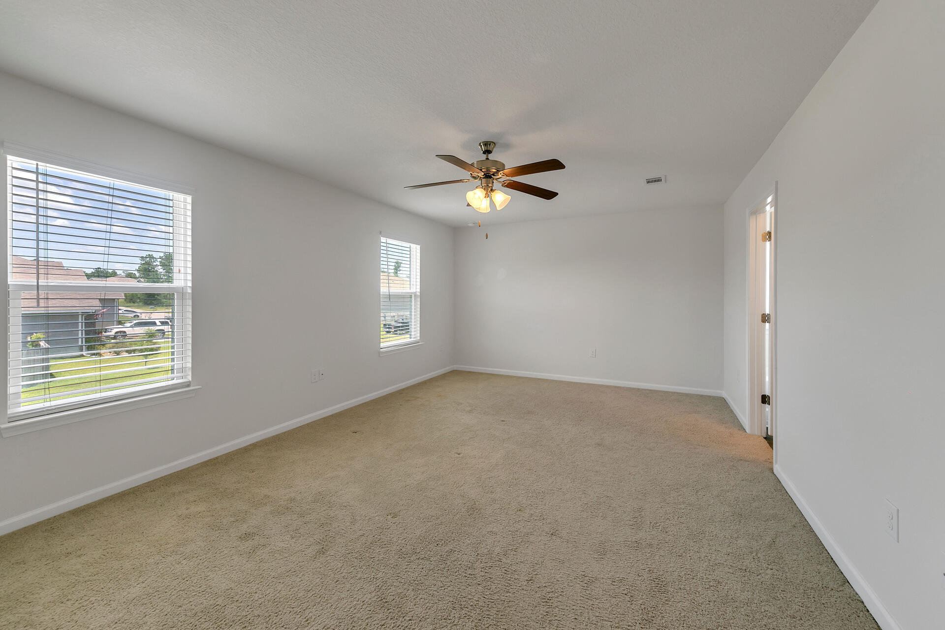 4624 Plover Drive Crestview, FL 32539 - Photo 26 of 34 a view of an empty room with a window