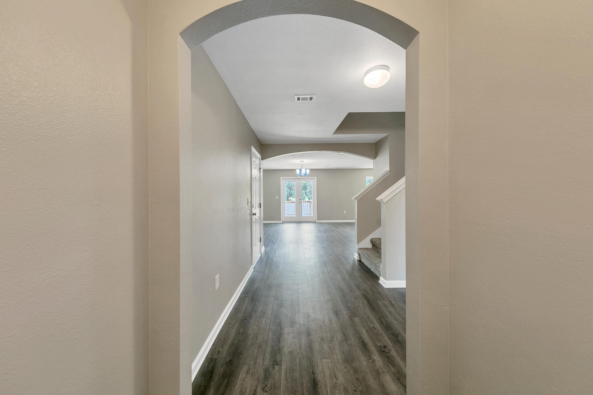 4624 Plover Drive Crestview, FL 32539 - Photo 5 of 34 a view of hallway with wooden floor