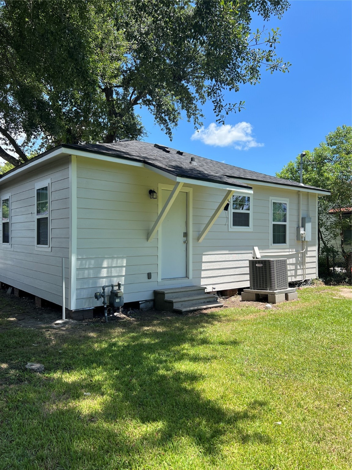 3001 Austin Street Vidor, TX 77662 - Photo 13 of 14 a view of a house with a yard