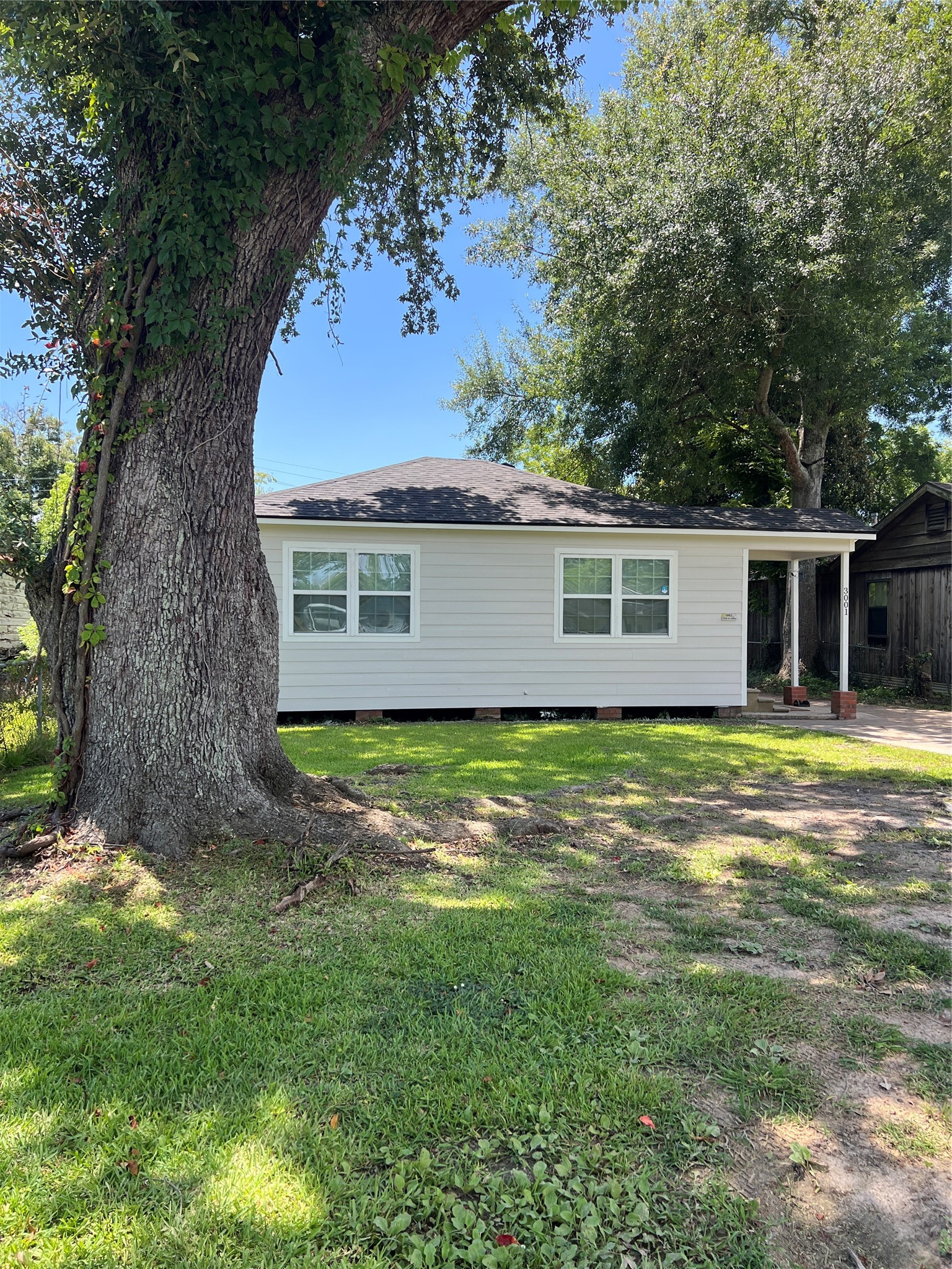 3001 Austin Street Vidor, TX 77662 - Photo 3 of 14 a view of a house with a backyard