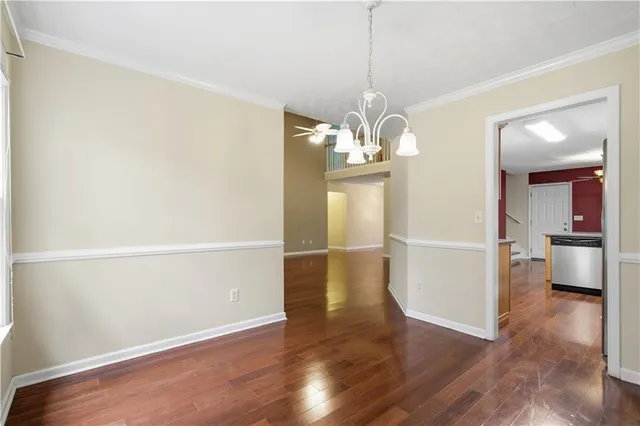 a view of a livingroom with wooden floor