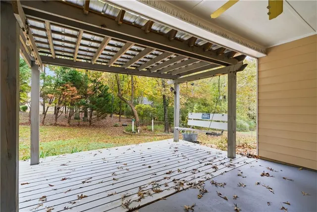 a view of swimming pool with a patio
