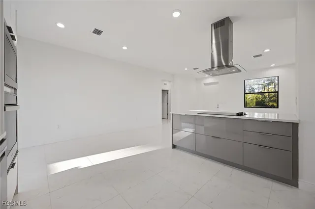 a view of cabinets and window