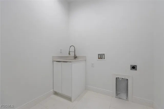 a bathroom with a sink and mirror