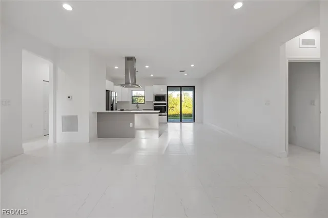 a view of a kitchen with a sink