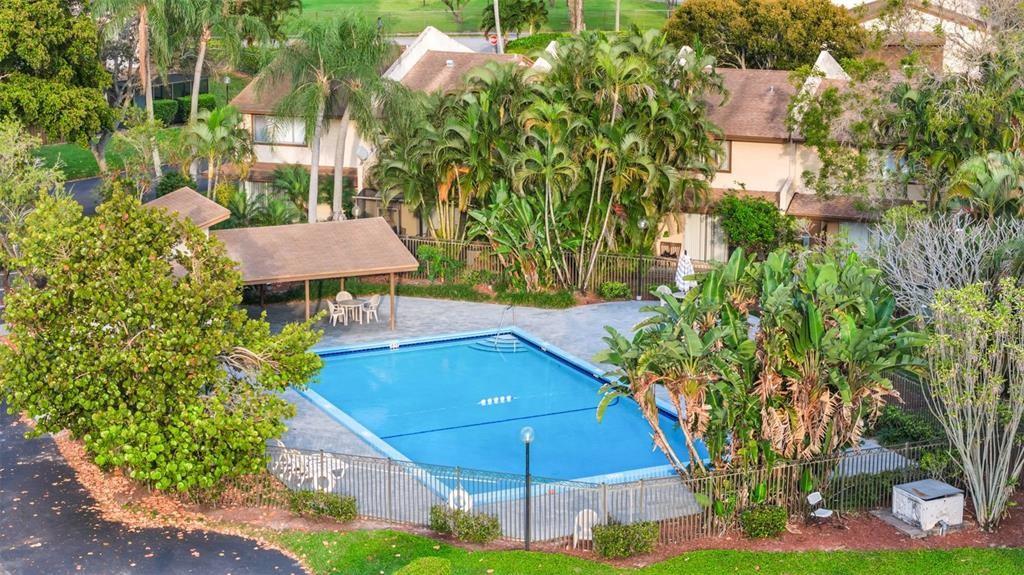 1153 Hampton Boulevard North Lauderdale, FL 33068 - Photo 10 of 10 a aerial view of a house with swimming pool garden and patio