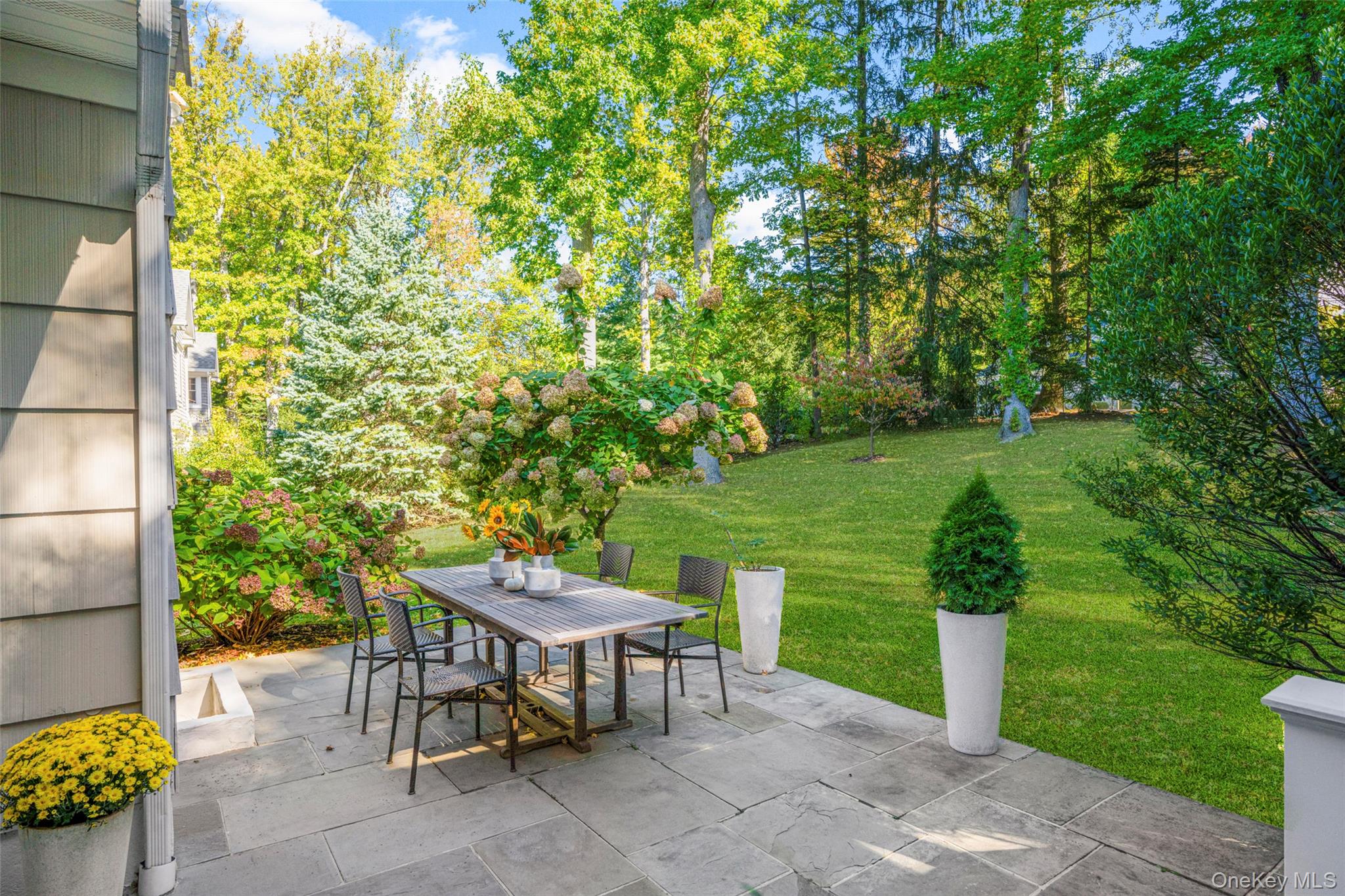 37 Barlow Lane Rye, NY 10580 - Photo 27 of 40 Beautiful blooms fill the outdoor space