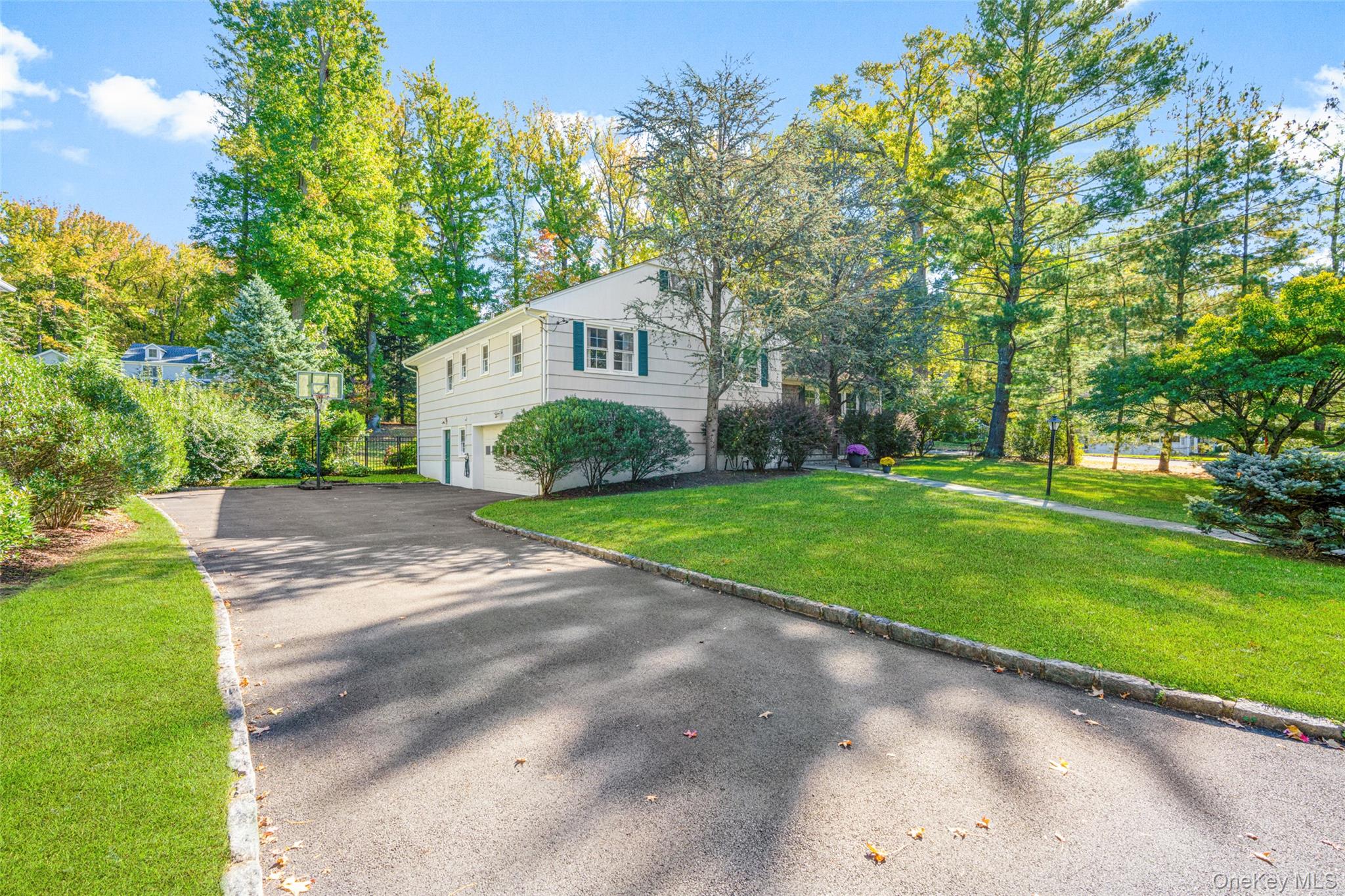 37 Barlow Lane Rye, NY 10580 - Photo 30 of 40 Long driveway for ample parking or a game of basketball.