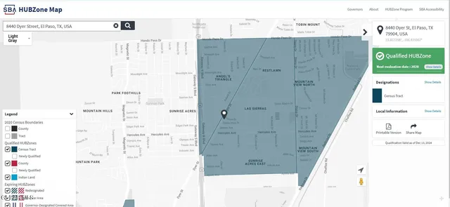 a view of a street with a building in the background