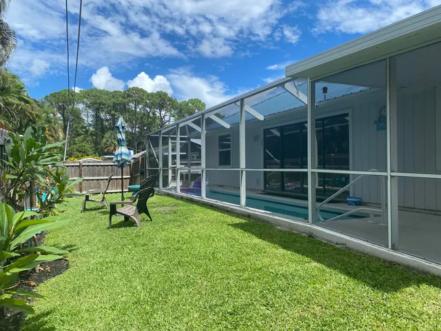 a house view with a garden space