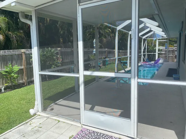 a house view with a glass door