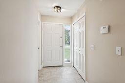 3196 Southwest Areca Drive Palm City, FL 34990 - Photo 6 of 21 a view of a hallway with a elevator