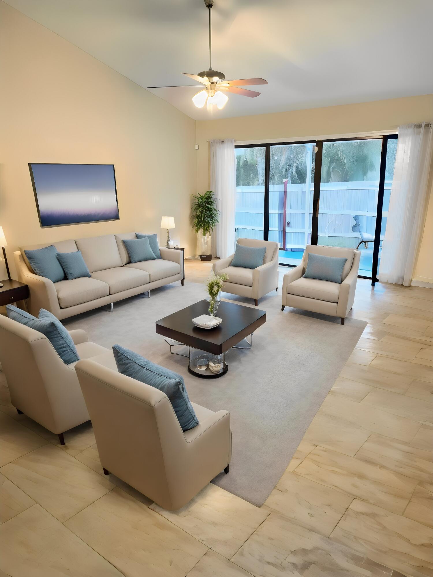 3196 Southwest Areca Drive Palm City, FL 34990 - Photo 8 of 21 a living room with furniture and a large window