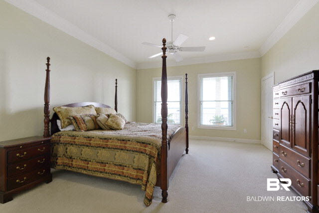 33168 River Road Orange Beach, AL 36561 - Photo 9 of 11 18.2' X 15.2' The master suite takes in the entire east wing of the second level.