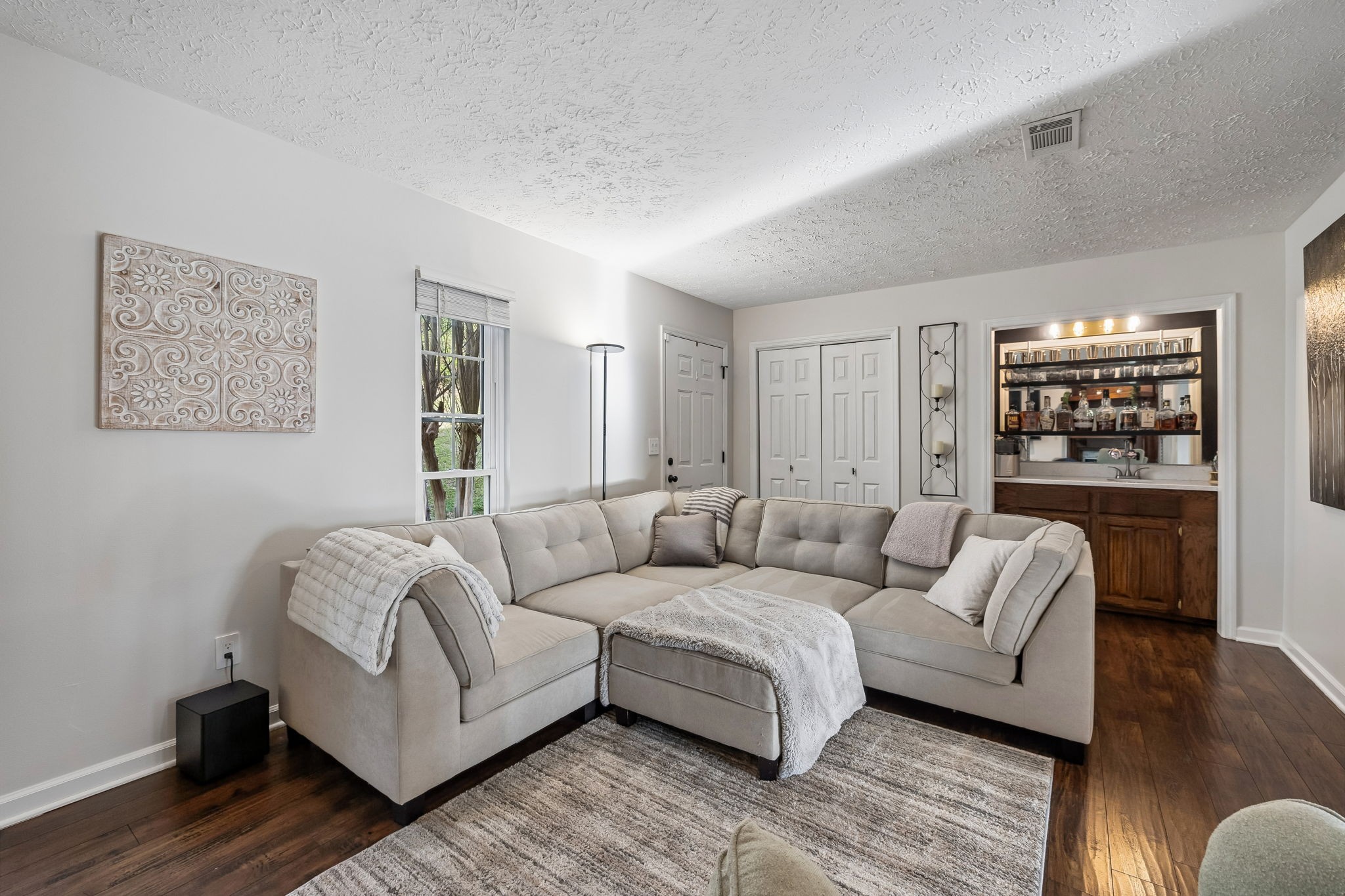387 Huntington Ridge Drive Nashville, TN 37211 - Photo 12 of 46 a living room with furniture and a wooden floor