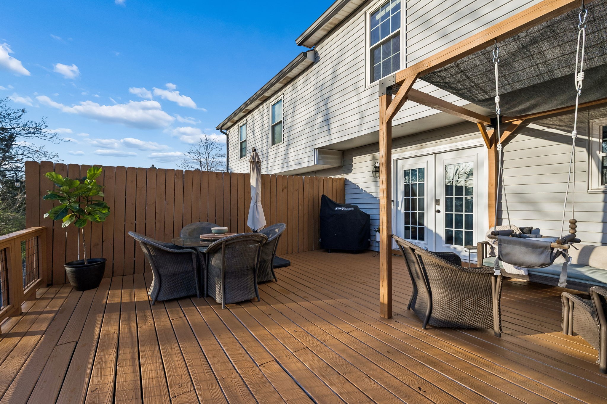 387 Huntington Ridge Drive Nashville, TN 37211 - Photo 31 of 46 a backyard of a house with table and chairs