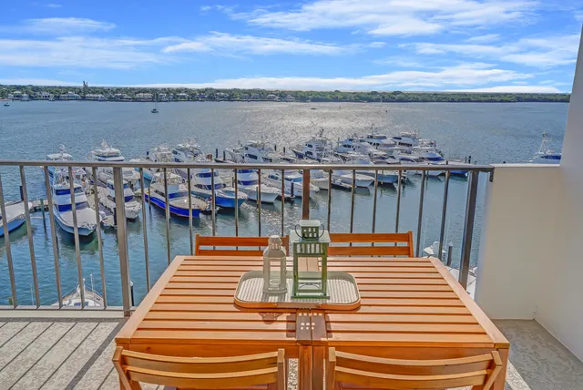 a view of a balcony with an ocean view