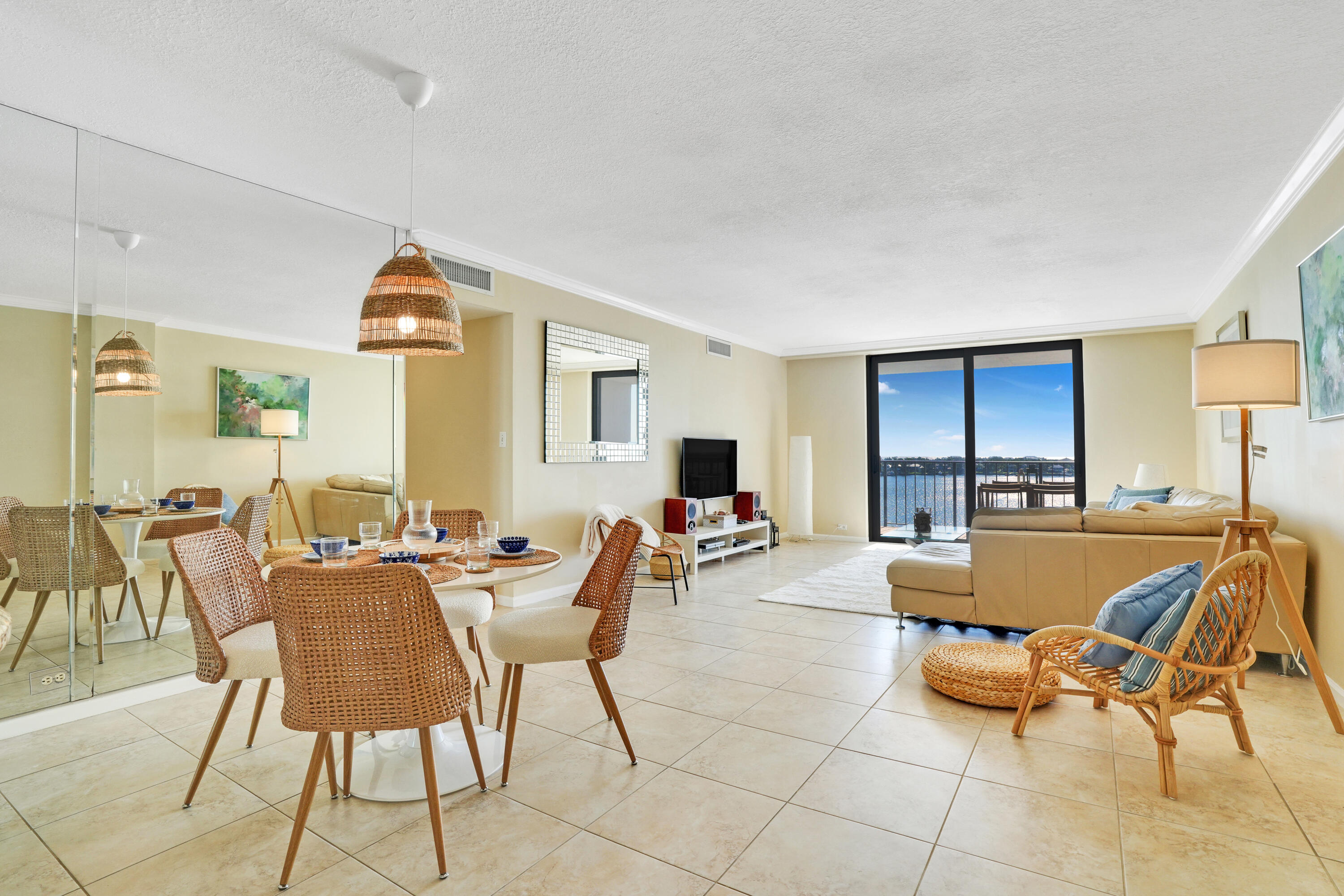1208 Marine Way, Unit 602 North Palm Beach, FL 33408 - Photo 2 of 25 a outdoor space with lots of furniture and a view of living room