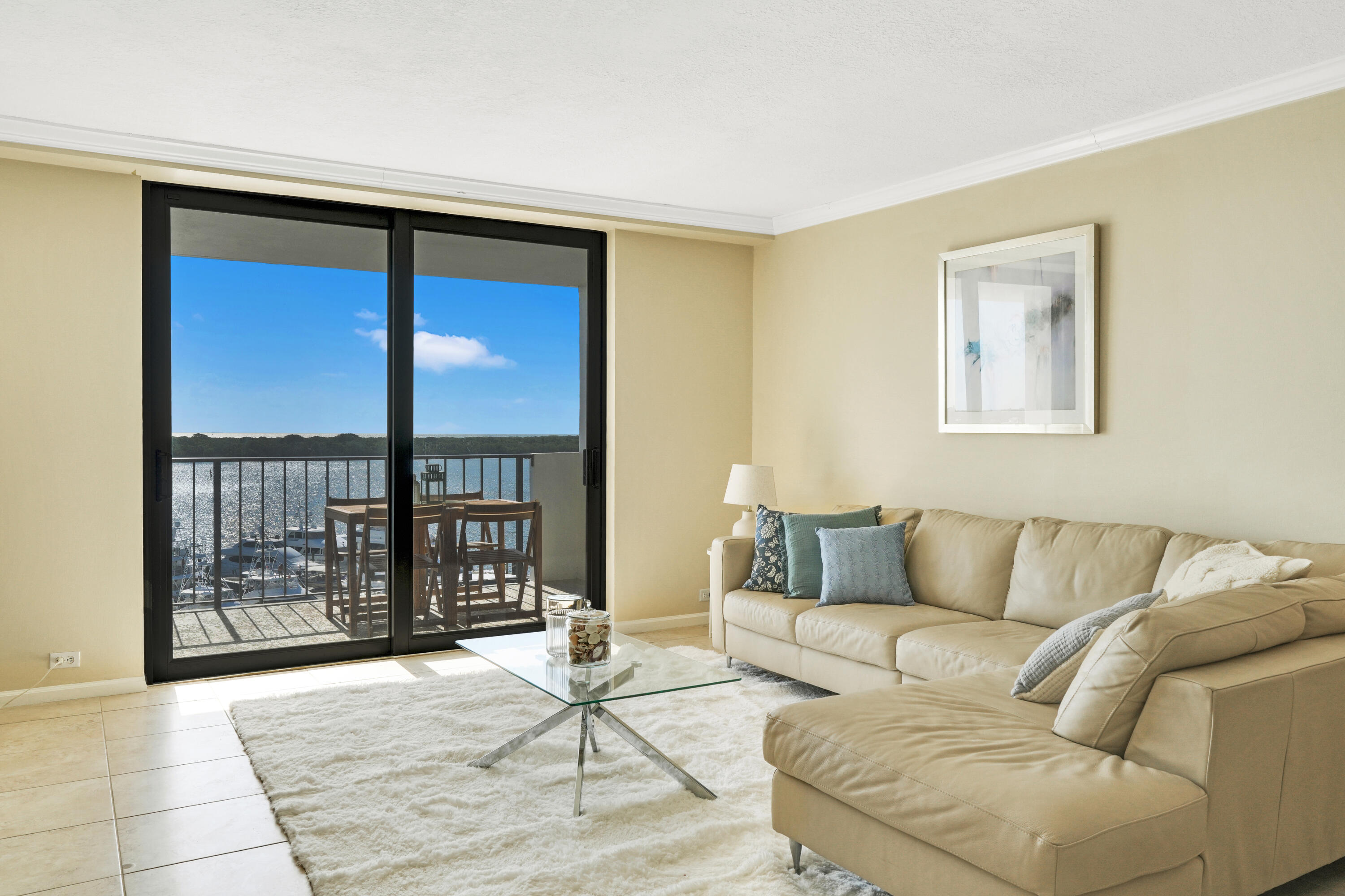 1208 Marine Way, Unit 602 North Palm Beach, FL 33408 - Photo 10 of 25 a living room with furniture and a window