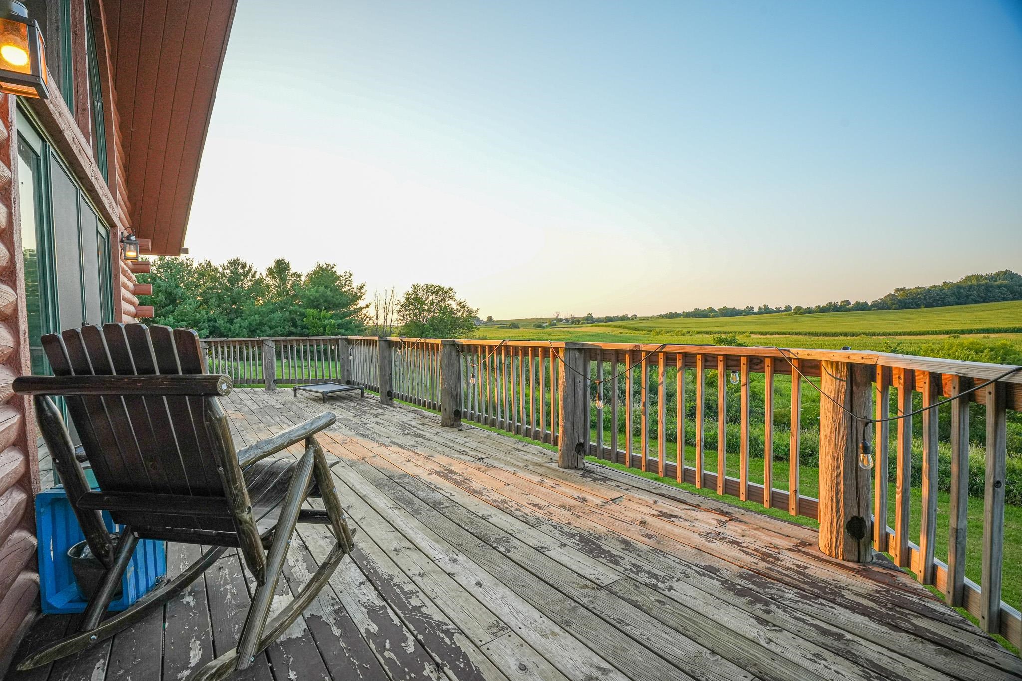 976 Paw Paw Road Paw Paw, IL 61353 - Photo 46 of 79 a view of balcony with wooden floor and fence