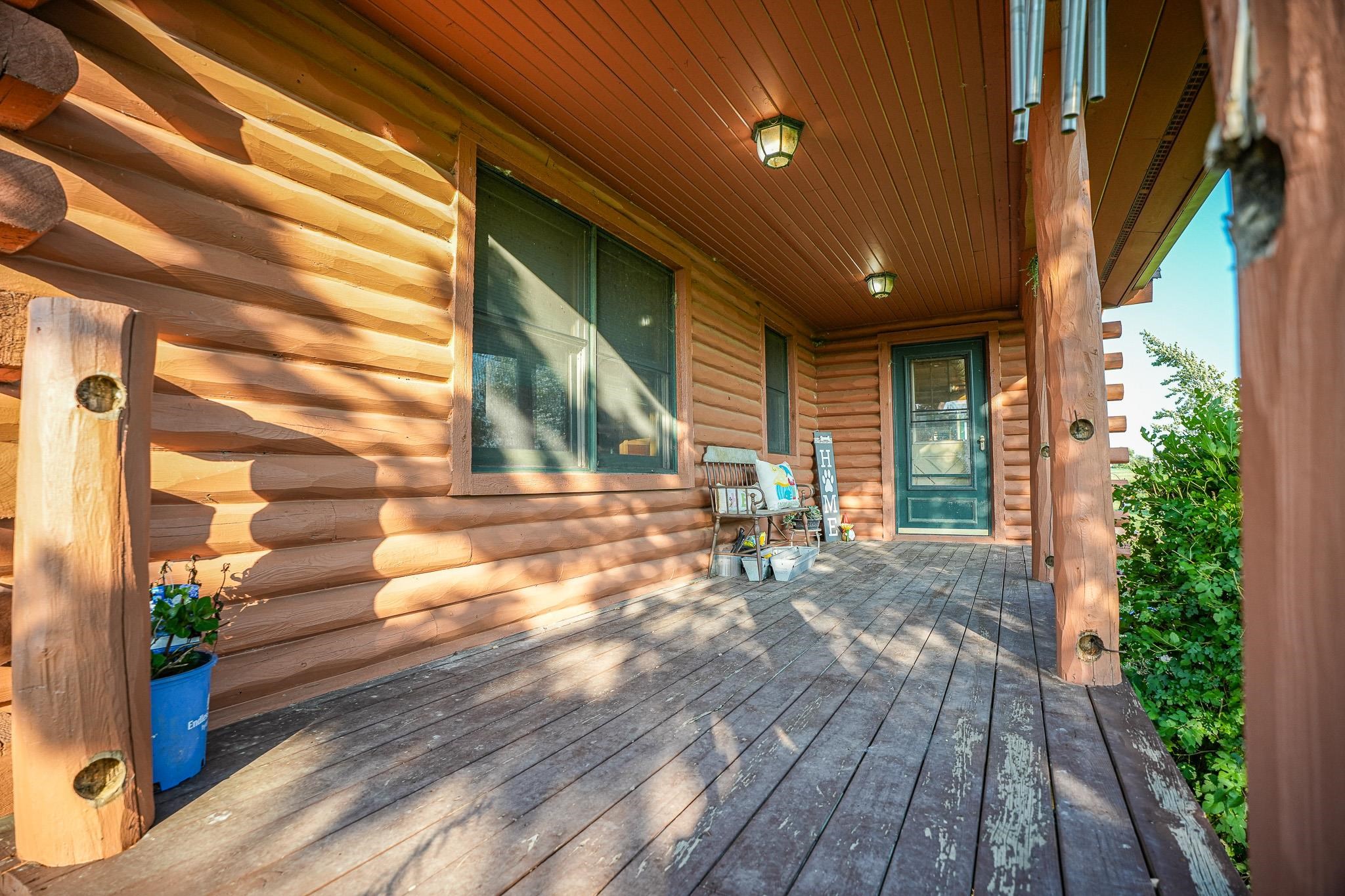 976 Paw Paw Road Paw Paw, IL 61353 - Photo 54 of 79 a view of outdoor space with wooden floor and windows