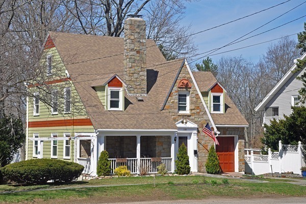 1188 Brook Road Milton, MA 02186 - Photo 1 of 12 front view of house with a yard