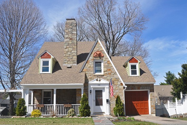 1188 Brook Road Milton, MA 02186 - Photo 2 of 12 a front view of a house with garden