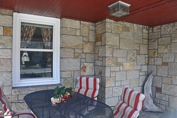 1188 Brook Road Milton, MA 02186 - Photo 3 of 12 a view of a door and chair in the patio
