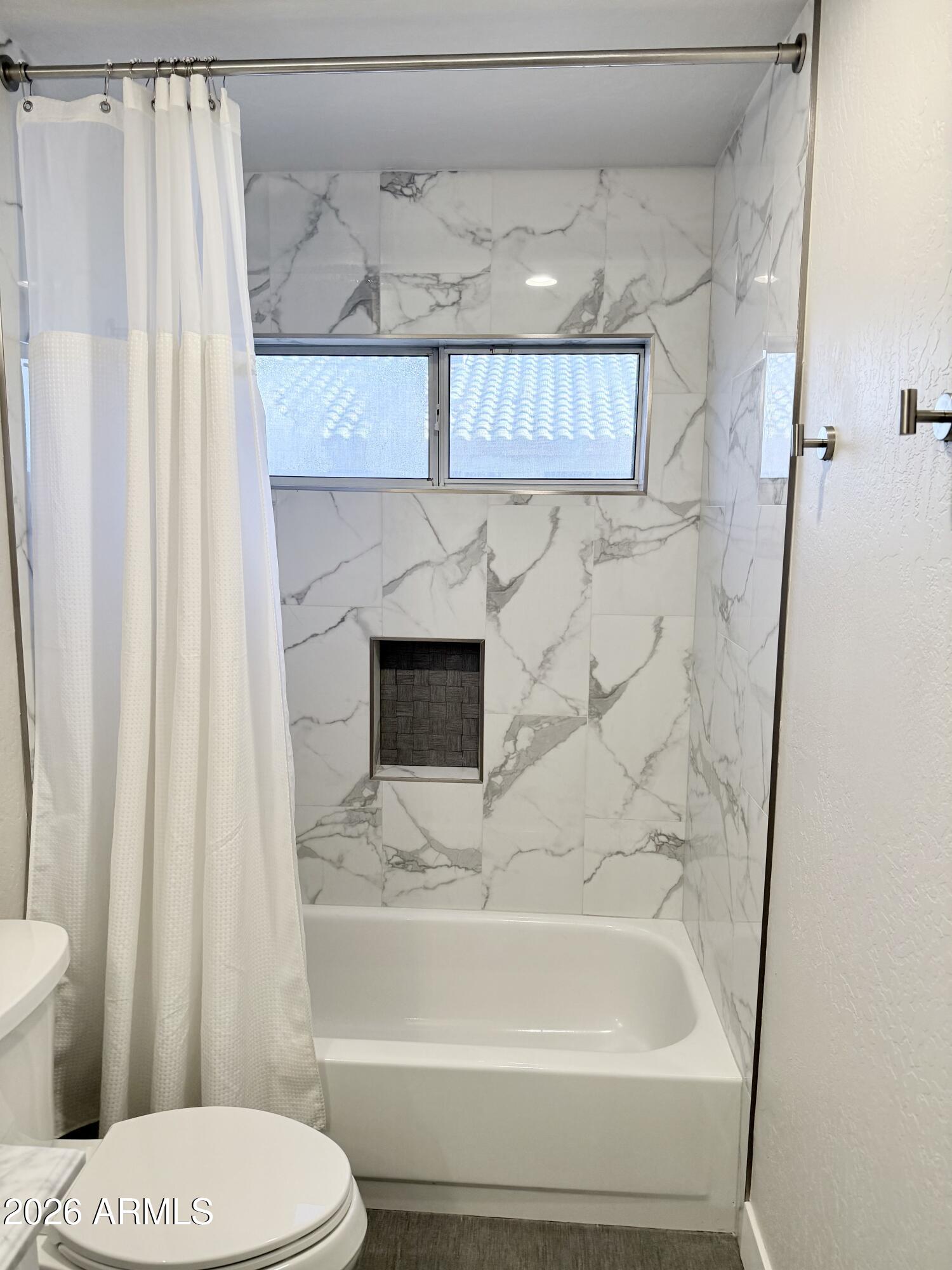 3426 East Clark Road Phoenix, AZ 85050 - Photo 30 of 48 a bathroom with a sink and a toilet