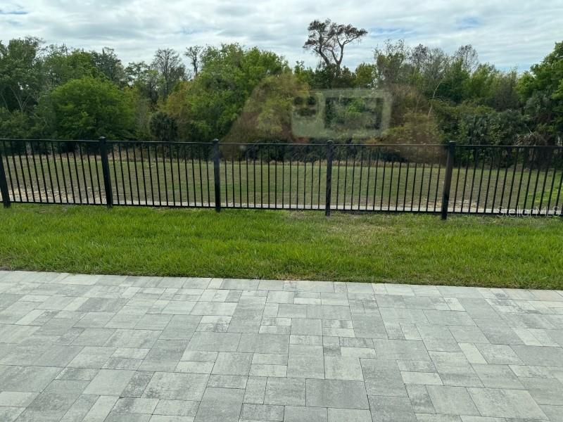 7920 Spectrum Drive Kissimmee, FL 34747 - Photo 2 of 13 a view of a backyard with a garden