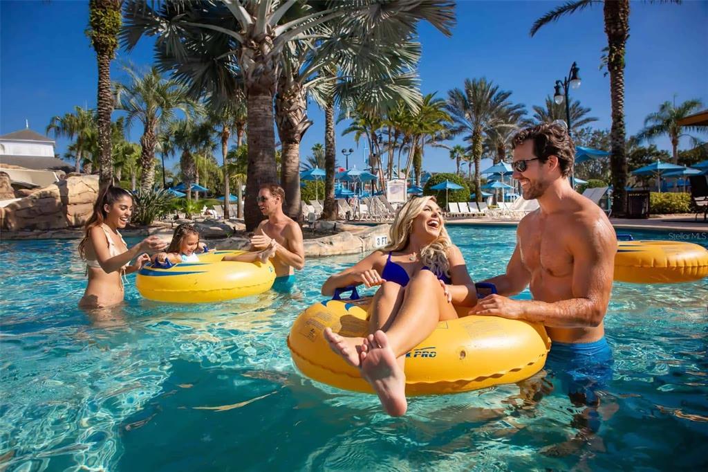 7920 Spectrum Drive Kissimmee, FL 34747 - Photo 3 of 13 a swimming pool with outdoor seating and yard