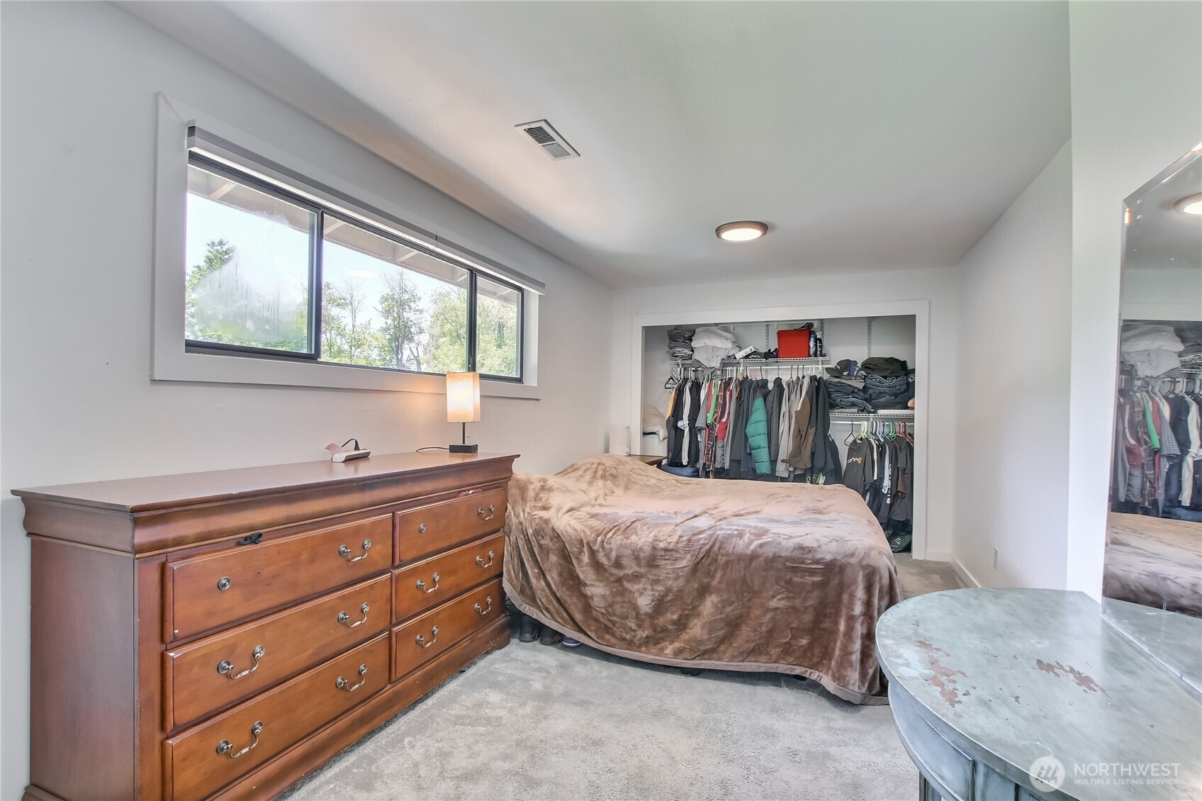13610 Southeast 288th Street Kent, WA 98042 - Photo 24 of 32 a bedroom with a bed and a dresser