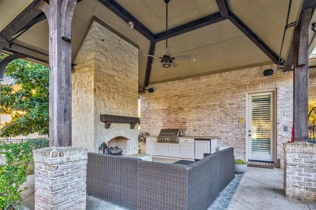 a view of an house with outdoor space and sitting area