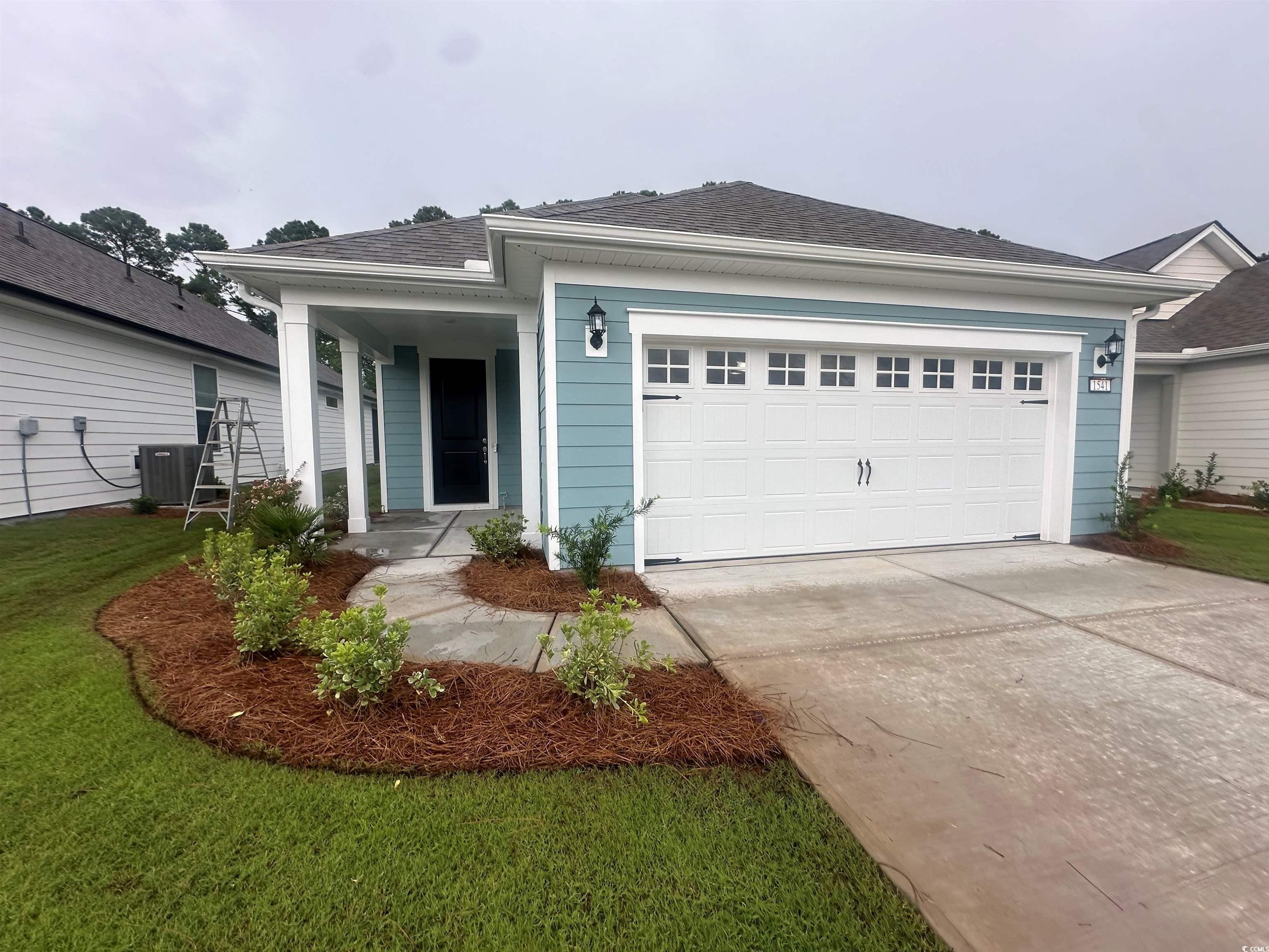1541 Littleleaf Loop North Myrtle Beach, SC 29582 - Photo 1 of 19 Ranch-style house featuring a garage, central AC u