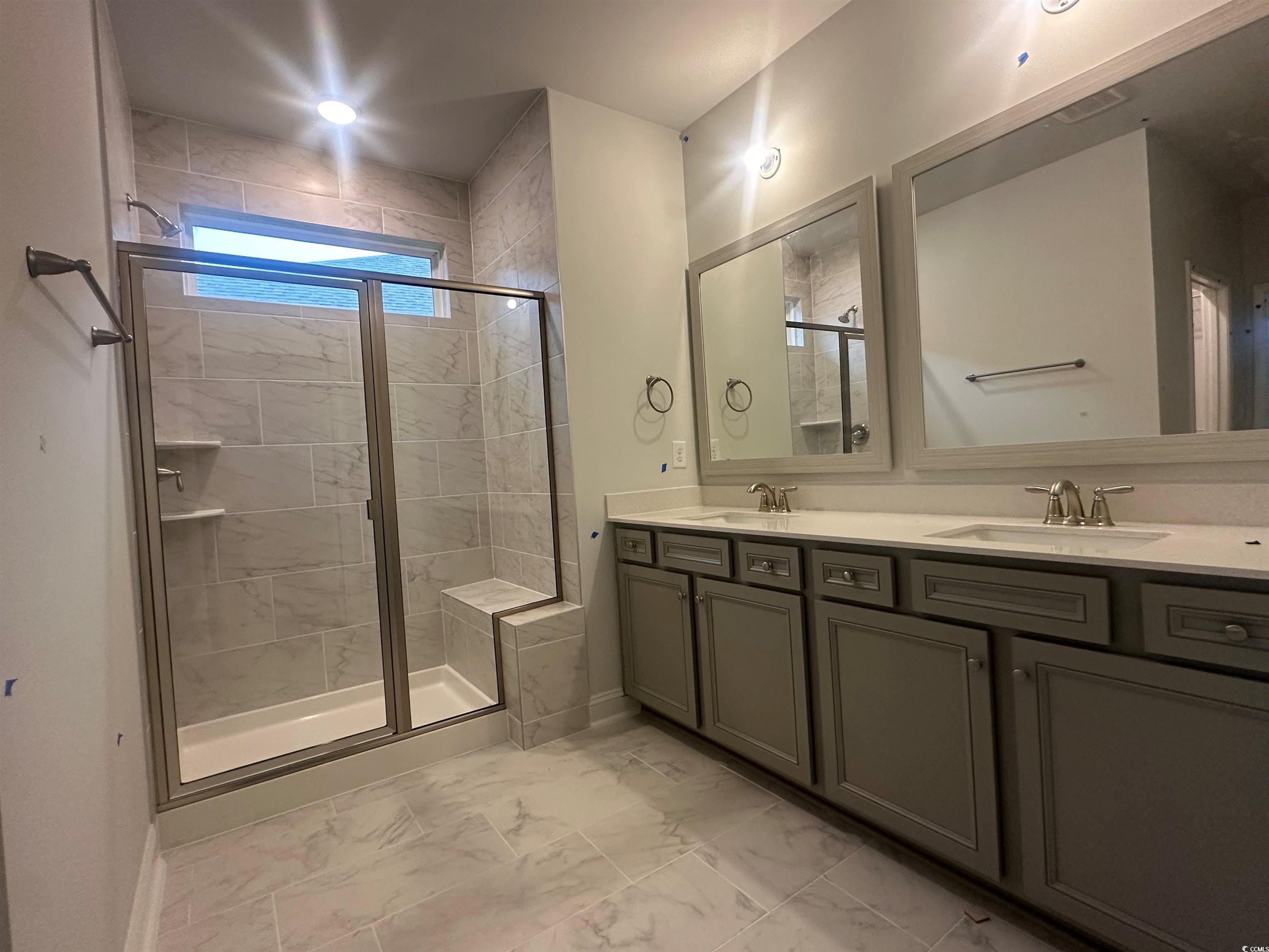 1541 Littleleaf Loop North Myrtle Beach, SC 29582 - Photo 9 of 19 Bathroom featuring a shower with shower door, tile