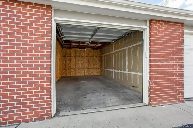 a front view of a building with a road