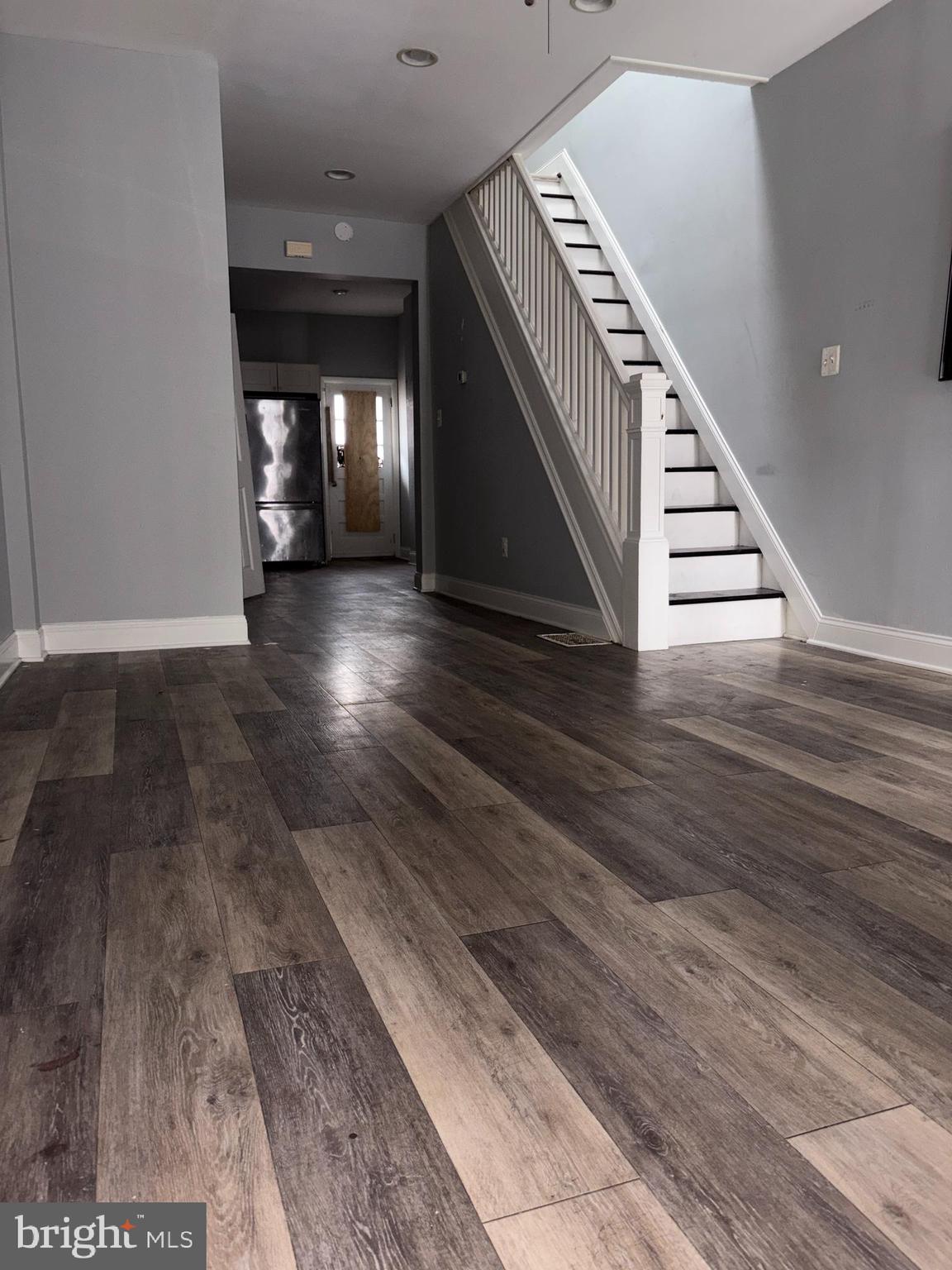3413 Noble Street Baltimore, MD 21224 - Photo 1 of 43 a view of entryway and hall with wooden floor