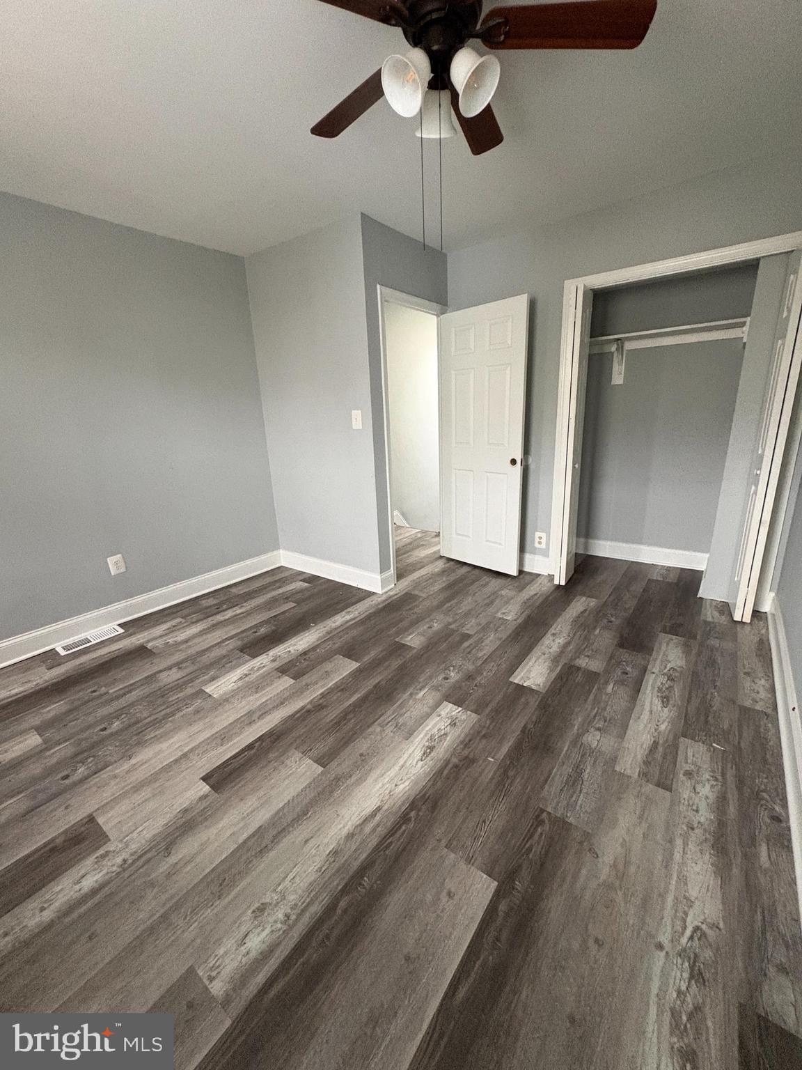 3413 Noble Street Baltimore, MD 21224 - Photo 15 of 43 a view of empty room with wooden floor
