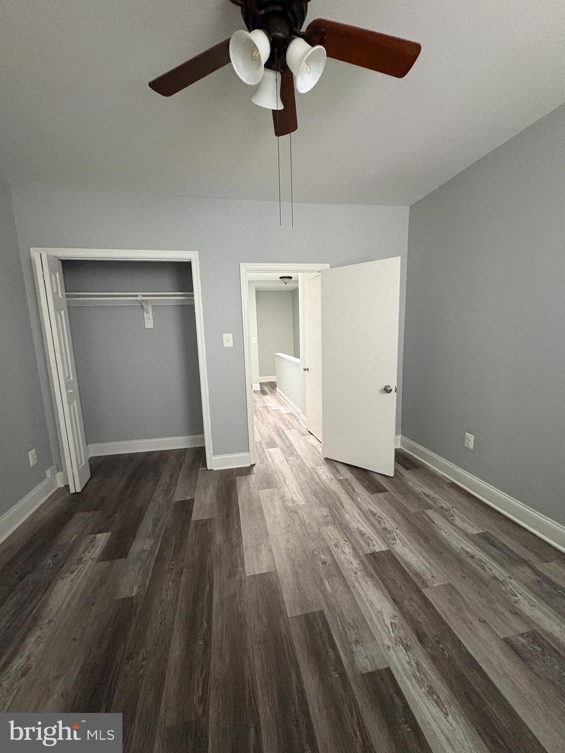 3413 Noble Street Baltimore, MD 21224 - Photo 16 of 43 a view of empty room with wooden floor