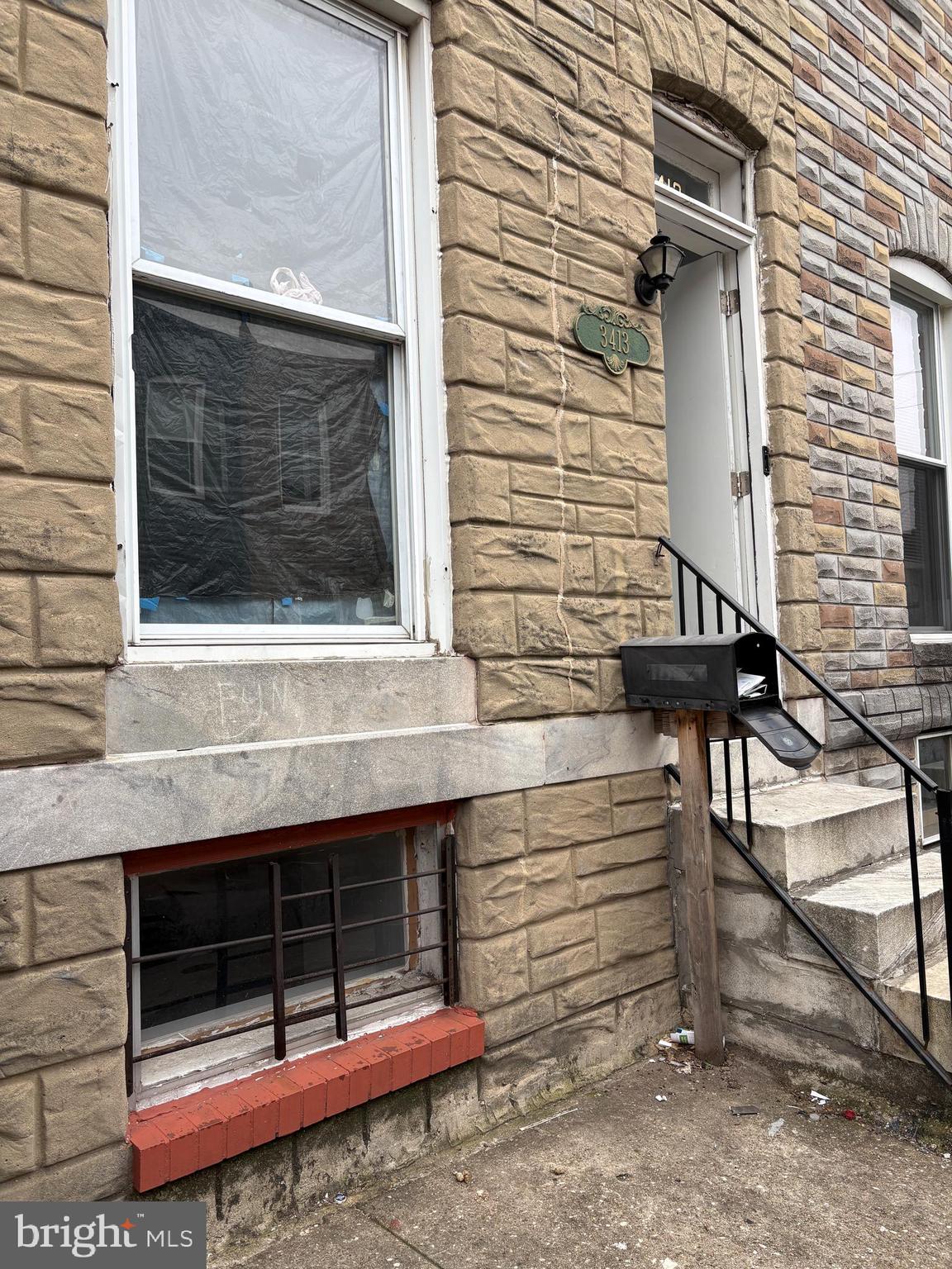 3413 Noble Street Baltimore, MD 21224 - Photo 2 of 43 a view of wooden door and a window