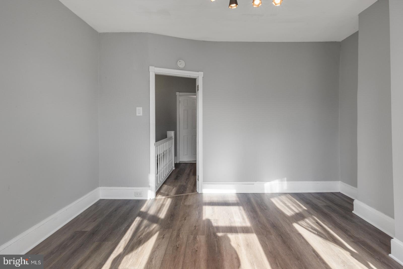103 Daly Street Philadelphia, PA 19148 - Photo 15 of 23 a view of wooden floor in an empty room
