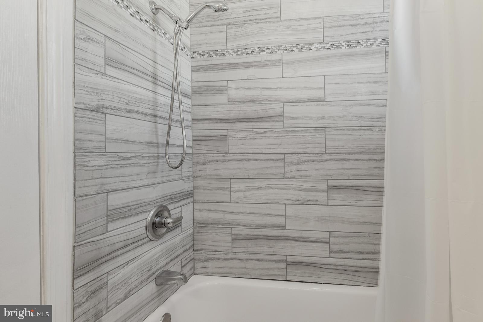 103 Daly Street Philadelphia, PA 19148 - Photo 19 of 23 a bathroom with a shower