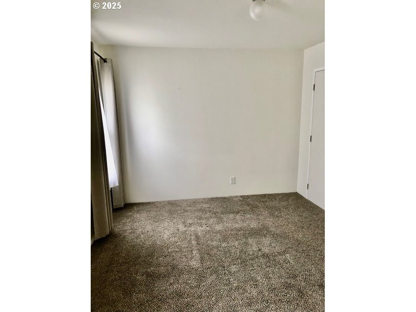 1475 Green Acres Road, Unit 76 Eugene, OR 97408 - Photo 11 of 23 a view of a room with a hallway