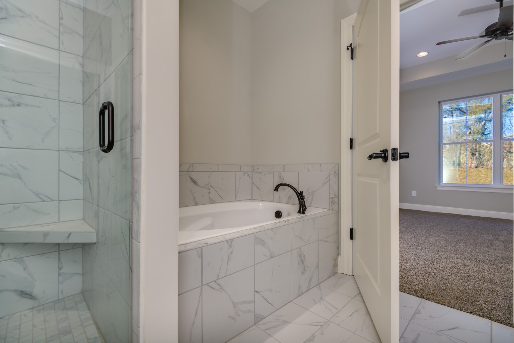 2290 Midland Road, Unit 7A Shelbyville, TN 37160 - Photo 15 of 44 a bathroom with a tub a window and a shower